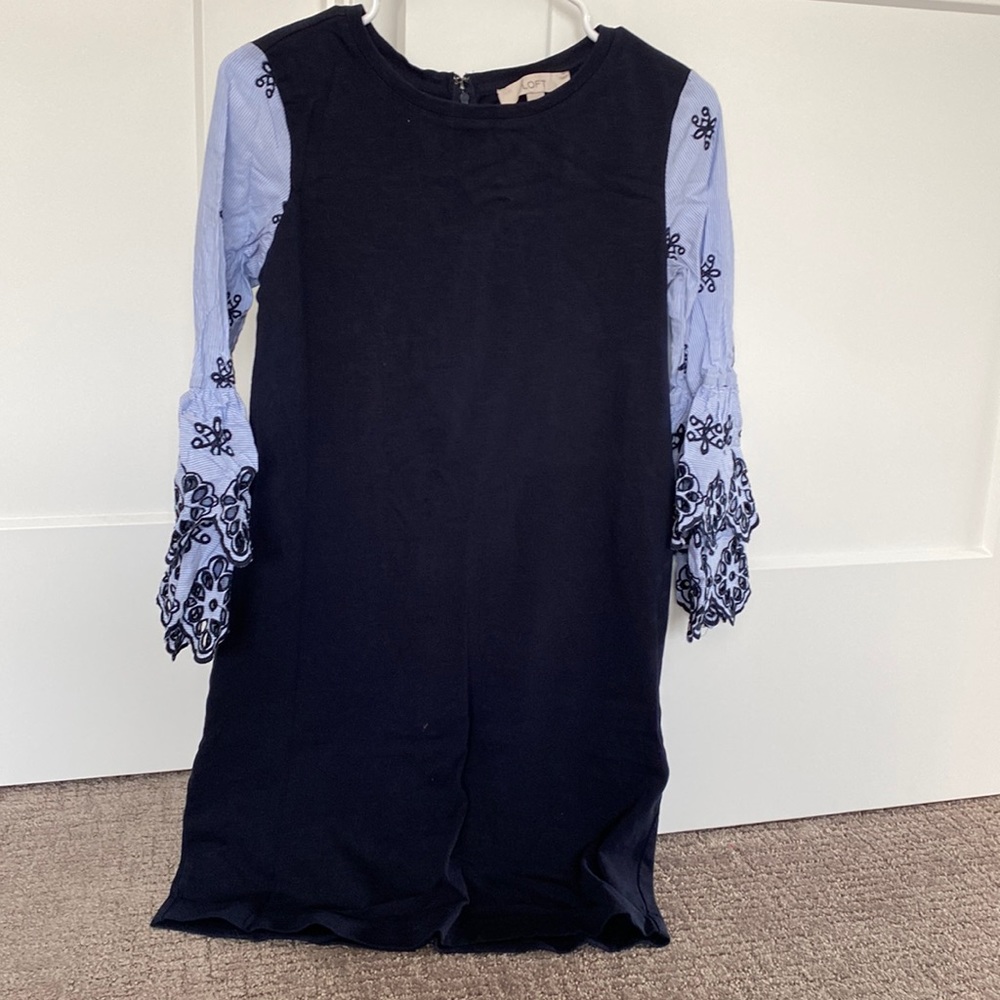 Navy blue dress with pattern detailed sleeves